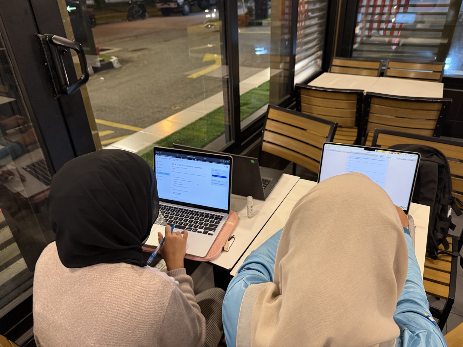 Participants working hands-on during a Meta Ads training session